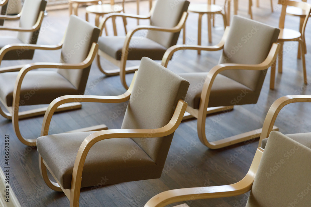 Aufkleber chairs stand in rows in the hall