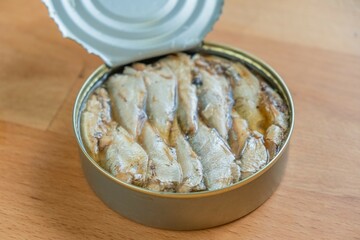 Fish preserves can open seafood oil tin. conserve meal.