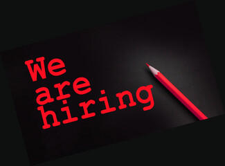 We are hiring words and yellow pencil besides. HR business concept
