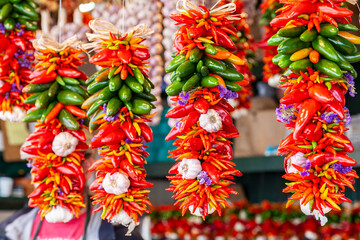 Chillies, Chili Peppers, Chillis and Garlic Display For Sale in a Market