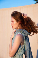 Fototapeta premium White european young woman with bright makeup with red hair