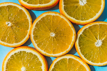 Fresh slices of oranges on the background view from the top