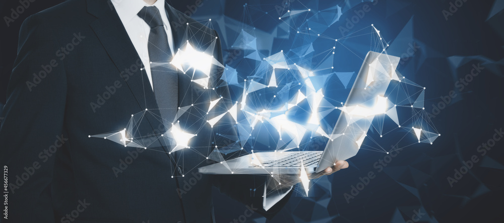 Poster businessman hands holding laptop with abstract glowing polygonal connections interface on dark backg