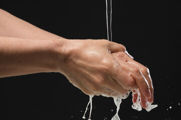 Washing your hand by alcohol sanitizer gel for protecting infection from a Covid-19 virus and other viruses.