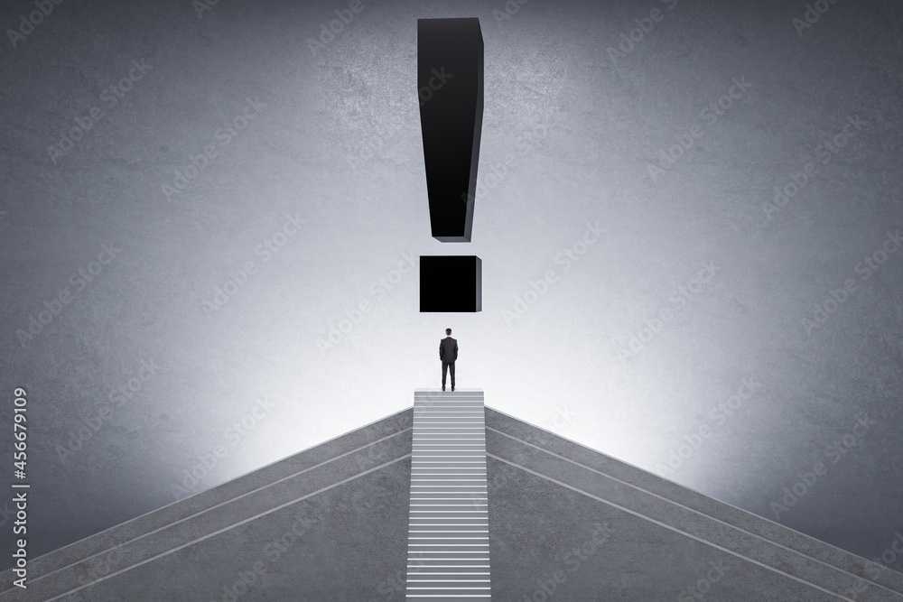 Poster back view of businessman on top of stairs with black exclamation mark on concrete background. future