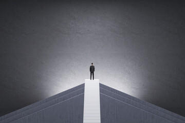 Back view of man in suit on top of stairs with mock up place on concrete background. Career growth and success concept.