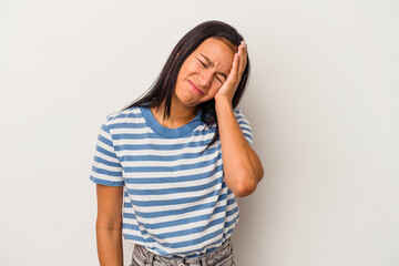 Young latin woman isolated on white background  tired and very sleepy keeping hand on head.