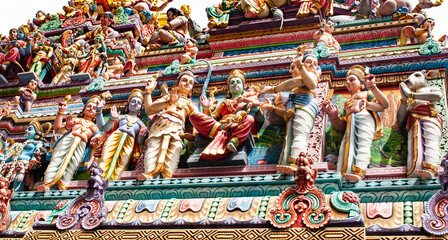 SINGAPORE, SINGAPORE - MARCH 2019: Intricate Hindu art and deity carvings on the facade of Sri Veeramakaliamman Temple in Little India, Singapore.