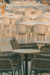 Empty chairs and tables in cafe during Covid-19 pandemics, town of Crikvenica in Croatia