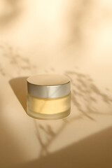 glass jars beauty hygiene products on beige background