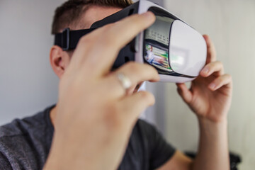 A man with glasses for virtual reality, a future technological concept. Interactive 3D viewing through VR glasses, technological advances