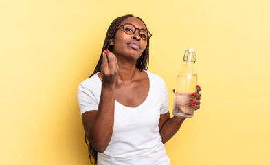 making capice or money gesture, telling you to pay your debts!. water bottle concept