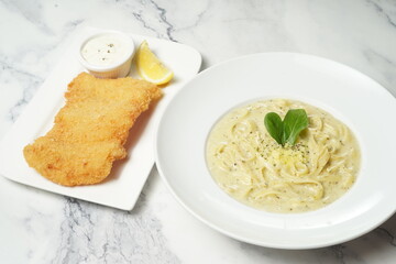 Pasta with deep fried fish