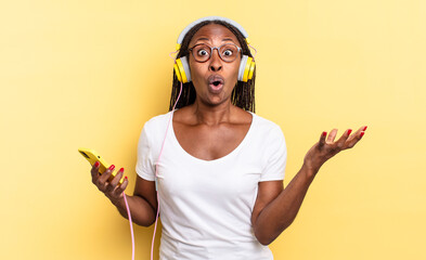 open-mouthed and amazed, shocked and astonished with an unbelievable surprise and listening music