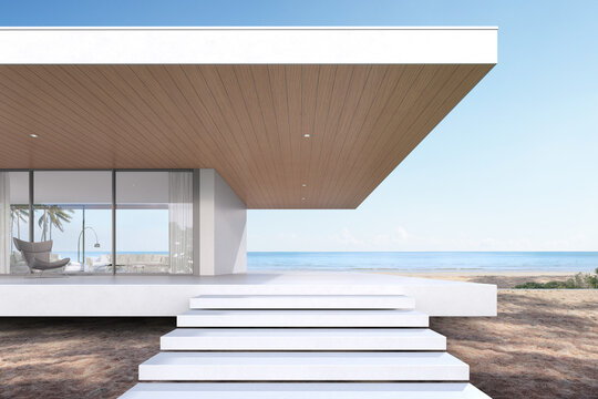 Perspective of modern luxury beach house with entrance stair on sea background, Exterior. 3d rendering.