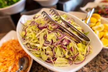 Cabbage and onion salad in a cafe.