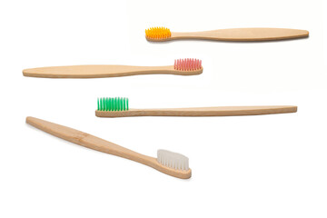 Bamboo toothbrush isolated on a white background.