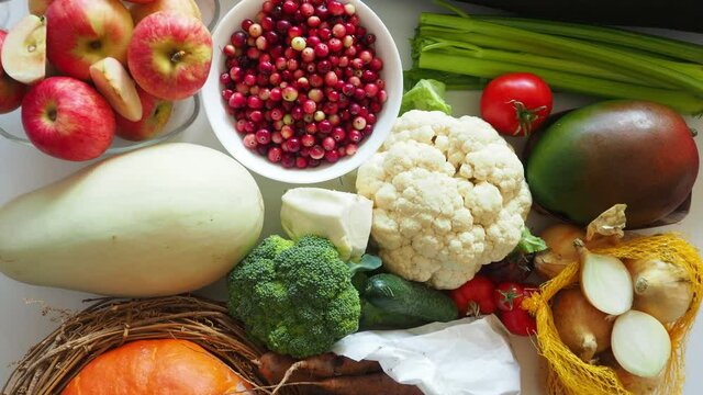 composition with assorted fresh organic fruits and vegetables for healthy food, harvest from garden. Detox diet