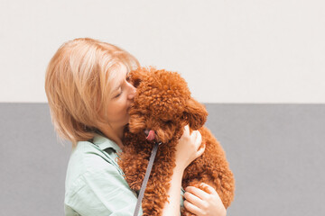 Pet parent concept. Portrait of woman with cute dog