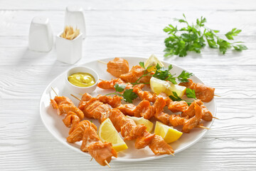 juicy grilled salmon kebabs with lemon and parsley