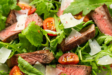 Italian Beef Tagliata salad with wild rocket, cherry tomatoes and parmesan cheese