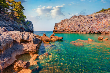 Incredible morning view of Stelolinari beach. Fantastic outdoor scene of Euboea island, Greece. Captivating summer seascape of Myrtoan Sea. Beauty of nature concept background.