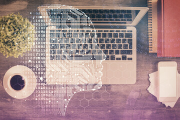 Double exposure of brain drawing hologram over topview work table background with computer. Concept of big data.