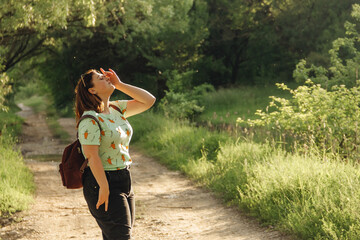 Redhead girl in greenery