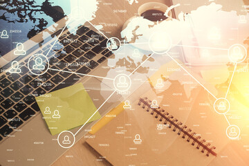 Double exposure of social network drawing and desktop with coffee and items on table background. Concept of international connection.