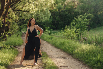 Redhead girl in greenery