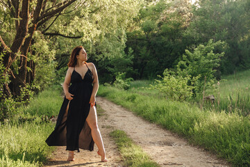 Redhead girl in greenery