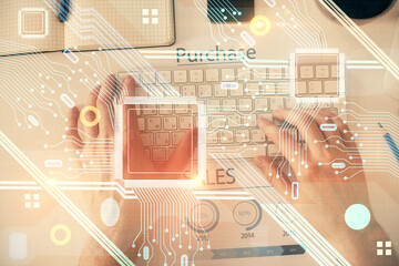 Multi exposure of man's hands typing over computer keyboard and data theme hologram drawing. Top...