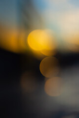 Blurred background, orange bokeh side of the setting sun.