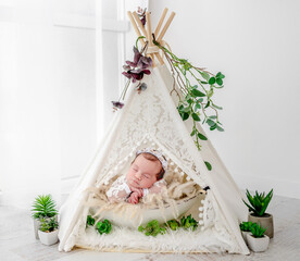 Newborn girl studio portrait © tan4ikk