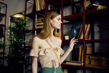 beautiful woman reading a book in a cafe communication