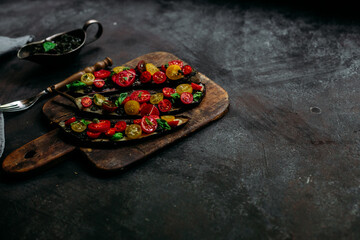 Baked eggplant appetizer with tomatoes and cheese