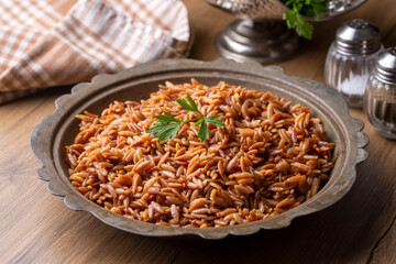 Traditional delicious Turkish dish, barley noodle pilaf (Turkish name; Arpa sehriye pilavi)
