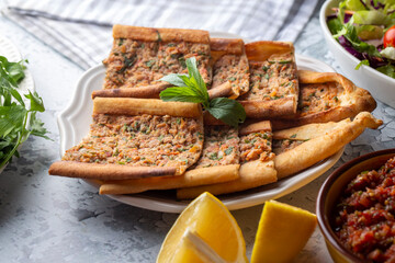 Traditional delicious Turkish food, pide with minced meat (Turkish name; kiymali pide - etli pide)