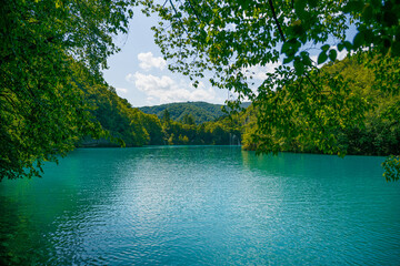 Plitviče Lakes National Park is a famous forest reserve in central Croatia. It's known for a chain of 16 terraced lakes, joined by waterfalls, that extend into a limestone canyon