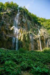 Plitviče Lakes National Park is a famous forest reserve in central Croatia. It's known for a chain of 16 terraced lakes, joined by waterfalls, that extend into a limestone canyon