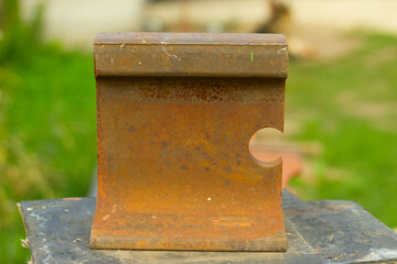 a piece of rusty rail
