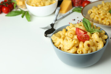 Concept of tasty eating with macaroni with cheese on white background