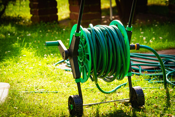 Garden hose for watering plants in garden