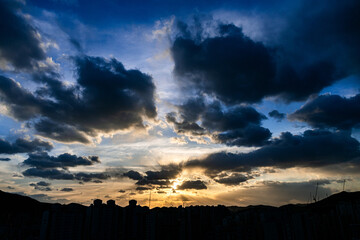 view from the roof of a skyscraper to sunset colorful sky cloud of cityview.