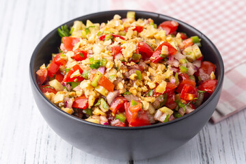 Traditional delicious Turkish cuisine, salad with tomatoes, cucumbers (Turkish name; Gavurdagi salata)