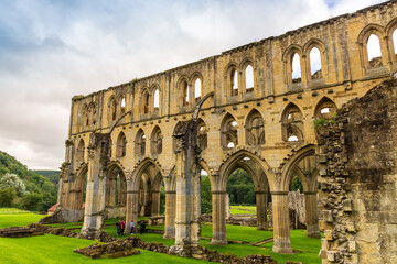 Fototapeta premium Ruins of Rievaulx Abbey, a Cistercian abbey in Rievaulx near Helmsley in the North York Moors National Park, England.
