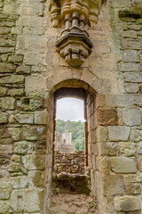 Fototapeta na wymiar Close-up architectural details at the Ruins of Rievaulx Abbey, a Cistercian abbey in Rievaulx near Helmsley in the North York Moors National Park.