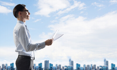 Concept of business success and control with confident boss against cityscape background