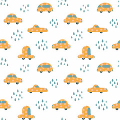 Seamless pattern with yellow cars in spots and raindrops on a white background. Vector hand drawn illustration. Suitable for nursery, for children, print for printing on fabric, wallpaper, bed linen