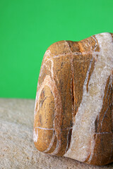 close-up natural stone texture on green background